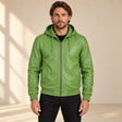 Male model wearing the Northwick Lime Green genuine leather zip hoodie, front view.
