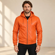 Male model wearing the Northwick Orange genuine leather zip hoodie, front view.