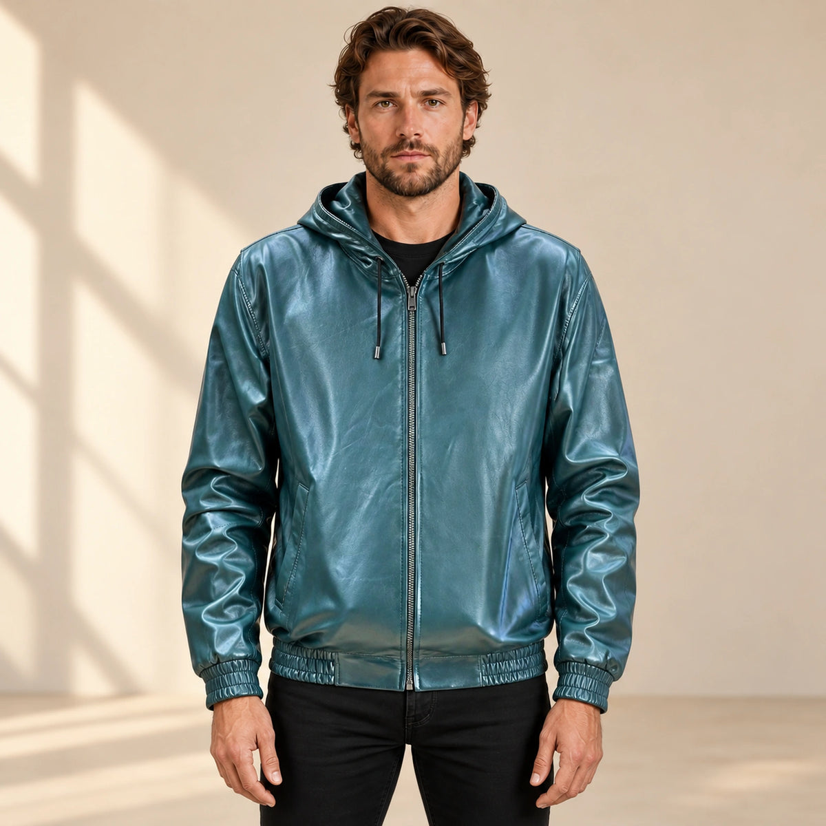 Male model wearing the Northwick Teal genuine leather zip hoodie, front view.