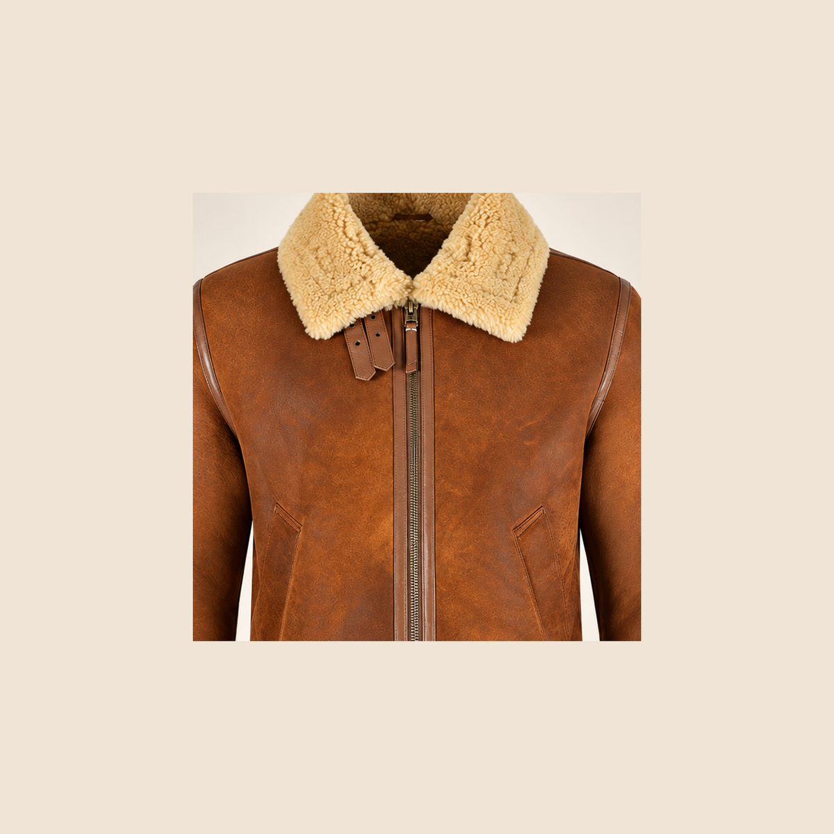 Leather grain and shearling close-up of the Oswin Men's Tan Vintage B3 Shearling Pilot Jacket