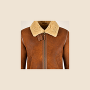 Leather grain and shearling close-up of the Oswin Men's Tan Vintage B3 Shearling Pilot Jacket