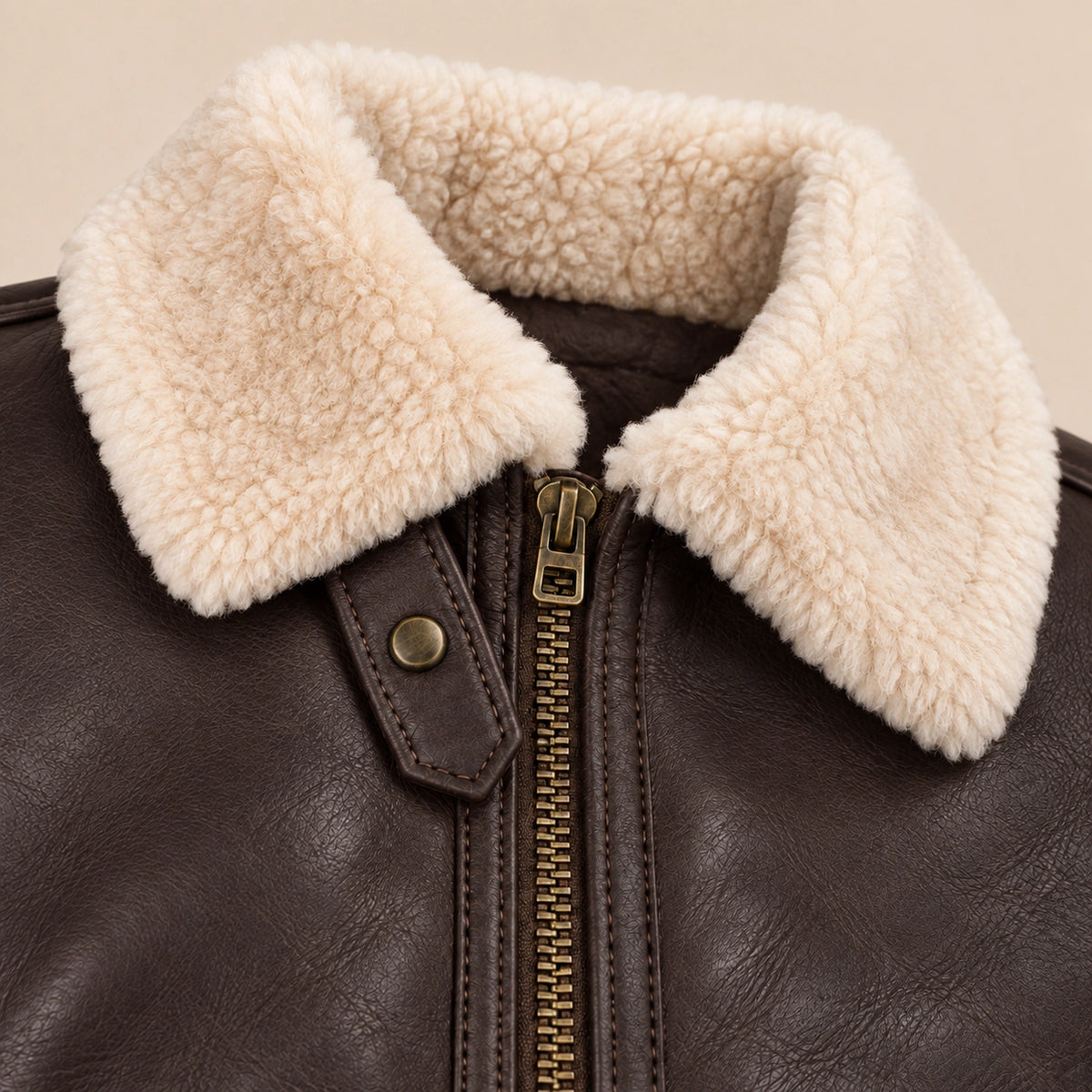Leather grain and shearling close-up of the Pembroke Men's Espresso Brown & Ivory B3 Shearling Jacket