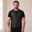 Male model wearing the Ravenscroft Black vintage waxed lambskin leather waistcoat, front view.