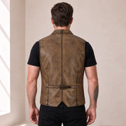 Male model wearing the Ravenscroft Mud vintage waxed lambskin leather waistcoat, rear view with waist adjuster.