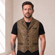 Male model wearing the Ravenscroft Mud vintage waxed lambskin leather waistcoat, front view.