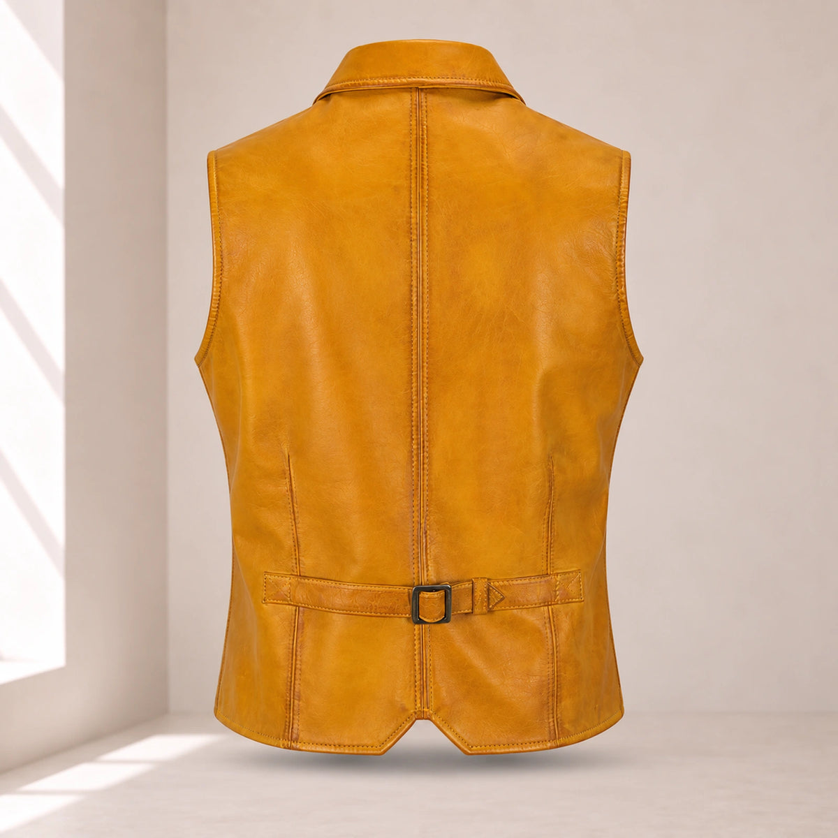 Ravenscroft Yellow vintage waxed lambskin leather waistcoat, rear product view with buckle strap.