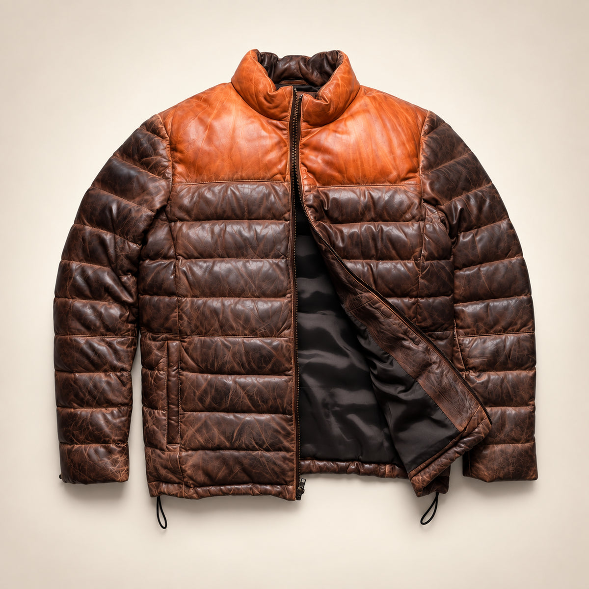 Partly open front showing the genuine lining area of the Ridgehaven tan & brown leather down jacket.