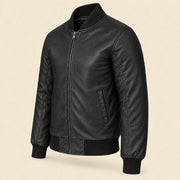 Three-quarter side view of black sheepskin leather MA-1 bomber jacket