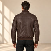 Male model wearing the brown sheepskin leather MA-1 bomber jacket, back view