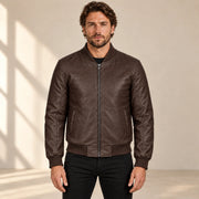 Male model wearing the brown sheepskin leather MA-1 bomber jacket, front view