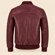 Back view of burgundy sheepskin leather MA-1 bomber jacket with shoulder yoke and ribbed hem
