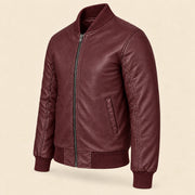 Three-quarter side view of burgundy sheepskin leather MA-1 bomber jacket
