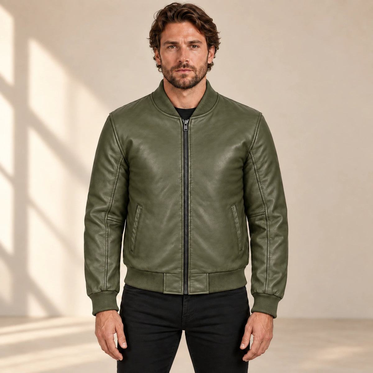 Male model wearing the green sheepskin leather MA-1 bomber jacket, front view