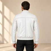 Male model wearing the white sheepskin leather MA-1 bomber jacket, back view