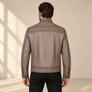 Taupe men's vintage lambskin biker jacket, model back.