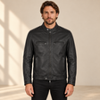 Black men's snap-collar lambskin biker jacket, model front.