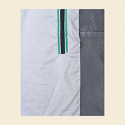 Grey men's snap-collar lambskin biker jacket, inner.