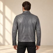 Grey men's snap-collar lambskin biker jacket, model back.