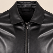Close-up of the leather texture and construction of the Tarnwick men's black vintage leather trench coat.
