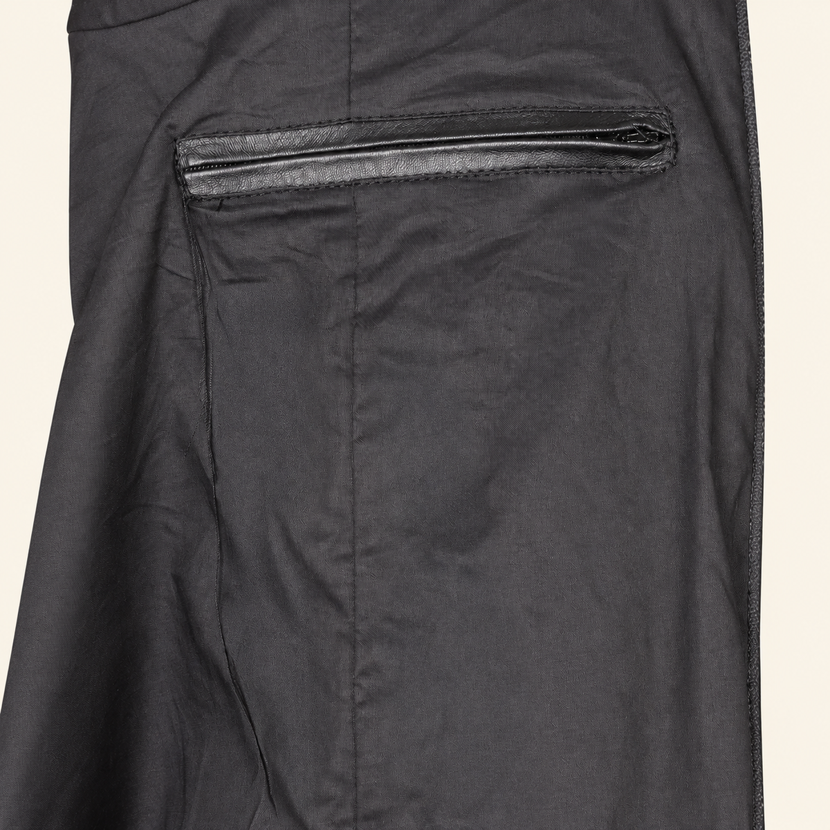 Interior construction and pocket detail of the Tarnwick men's black vintage leather trench coat.