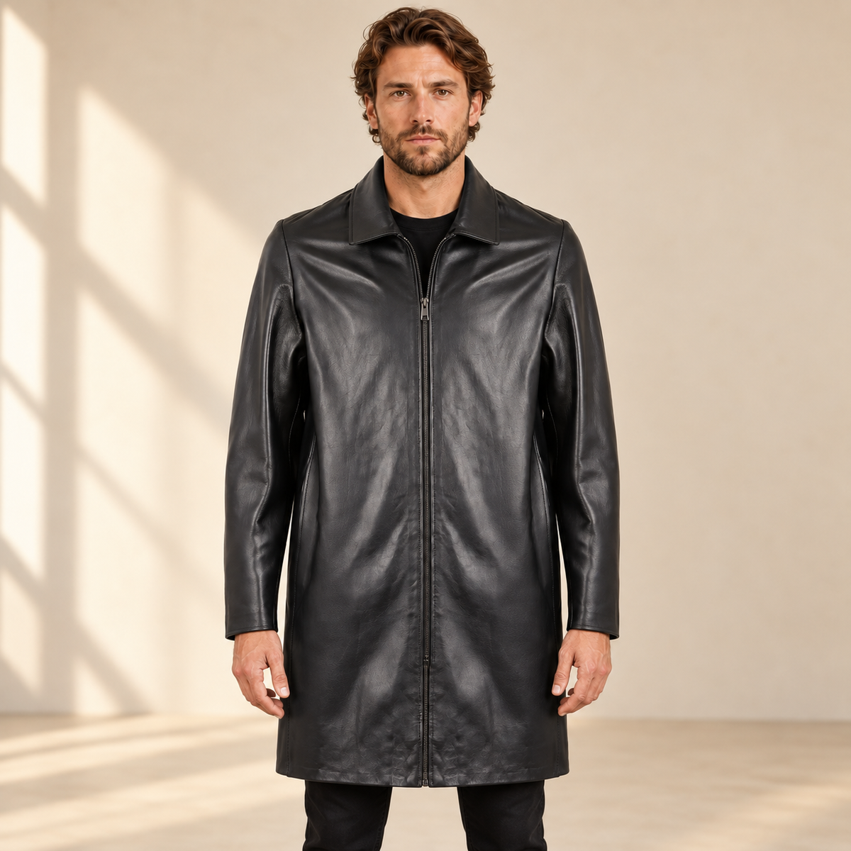 Front view worn by a male model of the Tarnwick men's black vintage leather trench coat.