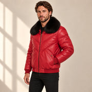 Three-quarter model view of the MOTOGRIP red lambskin leather puffer jacket, showing its red body with tonal V stitching.